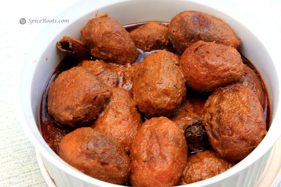 Deep fried potatoes cooked in a spicy sauce also known as Kashmiri dum aloo