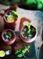 Tamarind Margarita with mint in clay galsses