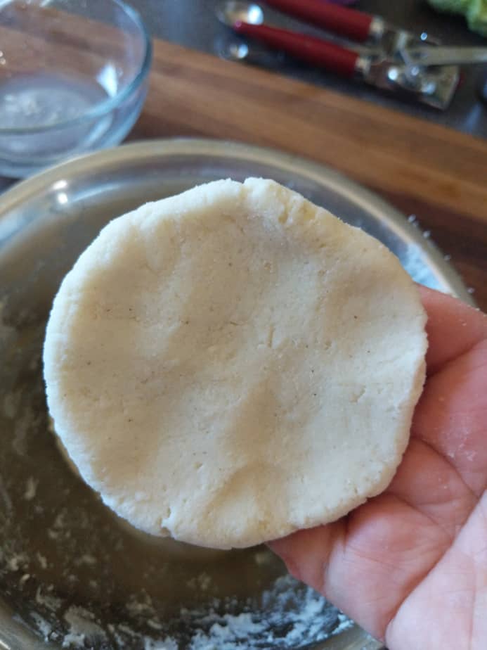 Picture of a flat pupusa dough