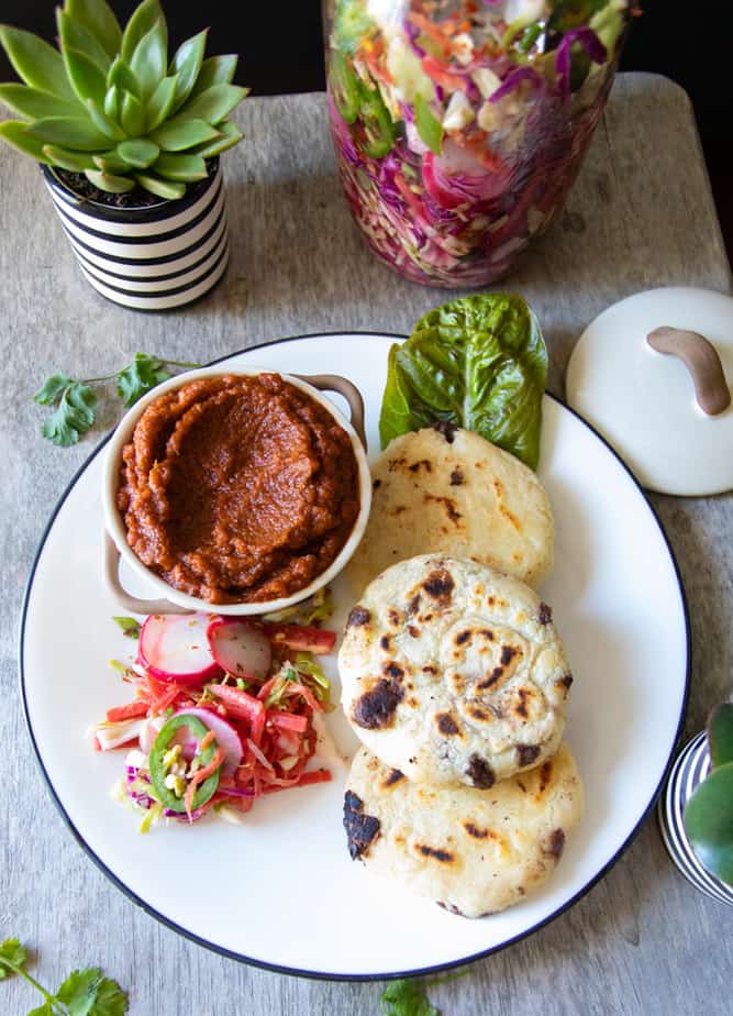 Pupusas with salsa roja and curtido