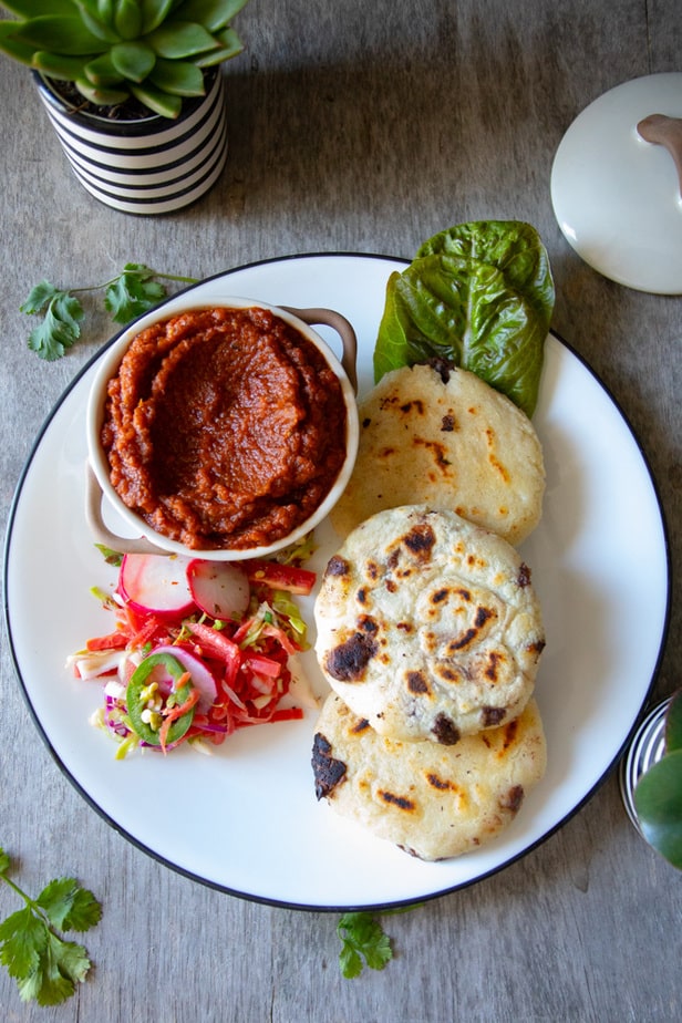 Pupusas with curtido and salsa roja